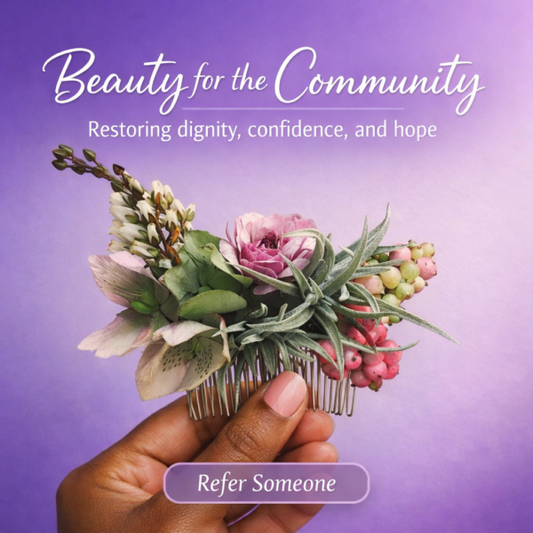 Woman of color holding a floral hair comb against a purple background for Beauty for the Community.